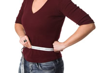 Use a tape measure to measure your waist